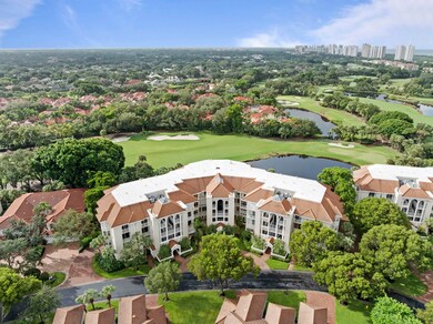 Drone / aerial view of a golf club and a nearby body of water