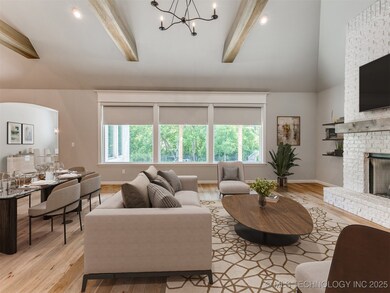 Sunny great room style living room with 16' ceilin
