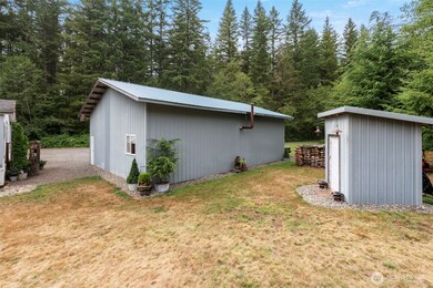 Wellhouse and back of shop. Wellhouse has lots of shelving space.