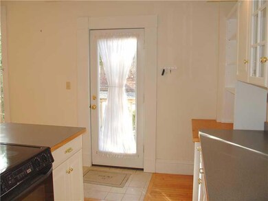 Kitchen. Side entrance from deck