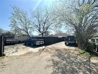 View of parking featuring fence