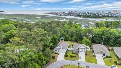Aerial view of property and surrounding area with 