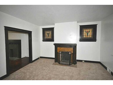 Living Room. The light shines through the stained 