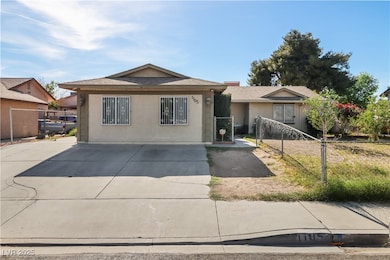 View of front of house featuring stucco siding and