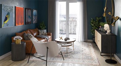 Living room with light hardwood / wood-style floor