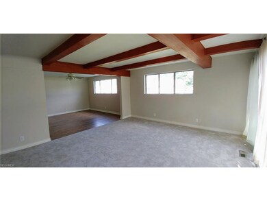 Living room looking into eat-in kitchen