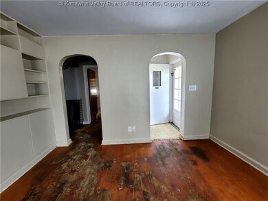 Living room view to entry and hallway