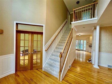 Two story foyer w/ 9' high ceilings on 1st floor