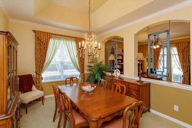 Dining room with half wall overlooking the front o