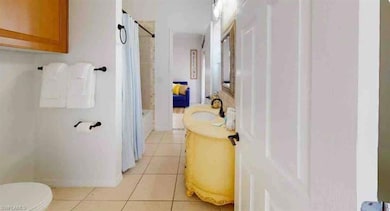 Full bath featuring toilet, shower / bathtub combi