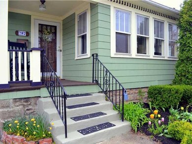 Exterior Front. Perrenials adorn the lot in front 