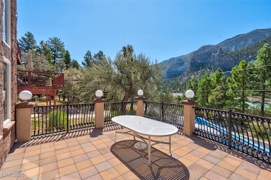 View of patio / terrace with a mountain view