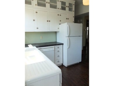 Kitchen comes applianced with refrigerator and dis