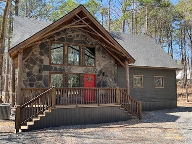 Chalet / cabin with stone siding, central AC unit,