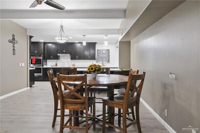 Dining room featuring light hardwood / wood-style floors and ceiling fan