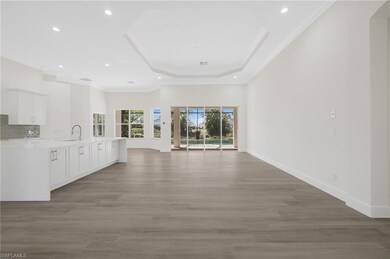 Unfurnished living room with light wood-style floo