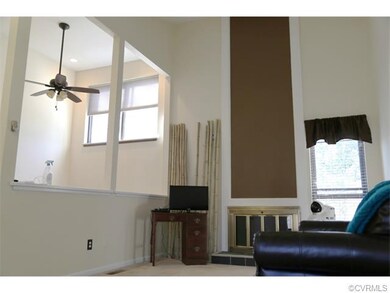 Great room with vaulted ceilings and wood burning 