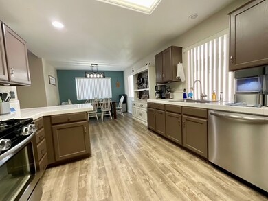Kitchen with appliances with stainless steel finis