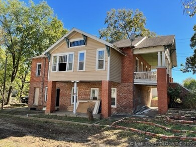 North side of 310 with basement access below front