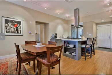 Gleaming hardwood floors throughout living areas and primary suite