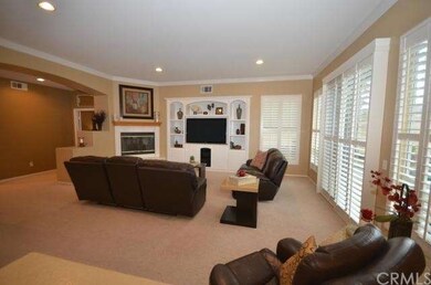 LARGE family great room with plantation shutters a