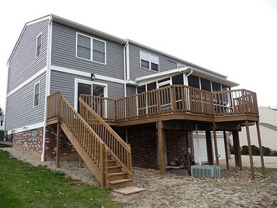 Exterior Back. An addition in 2011 added a full ba