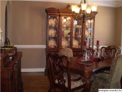 FORMAL DINING ROOM WITH HARDWOOD FLOORS
