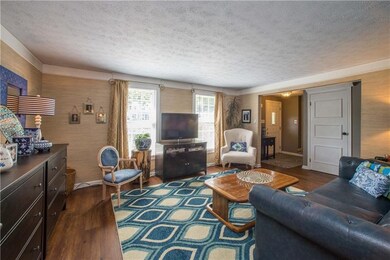 The formal living room features high-quality, low-
