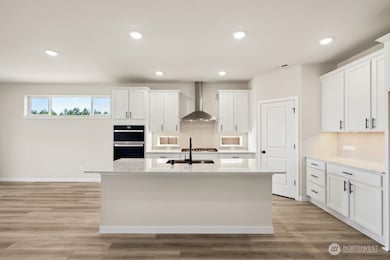 Photos are a completed home of the same floorplan.