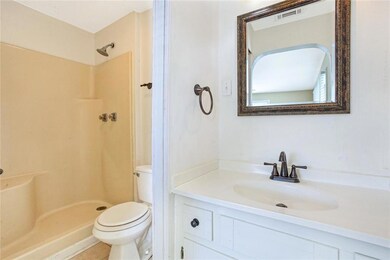 primary bathroom with sink outside the shower and