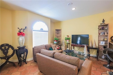 Living room featuring tile patterned flooring