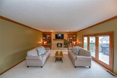 Nicely sized family room flows off of the kitchen,