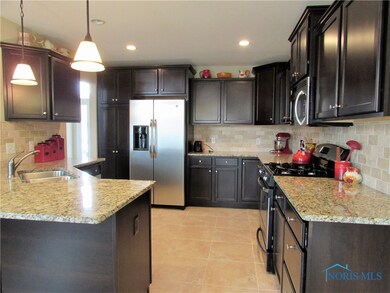 Kitchen with Tile Floors, Beautiful Cabinets, and Plenty of Storage