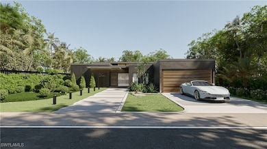 View of front of home featuring driveway, stucco s