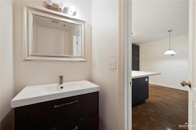 Bathroom featuring concrete floors and vanity