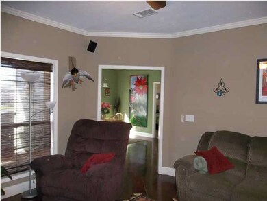 LOOKING FROM DEN INTO KITCHEN AREA