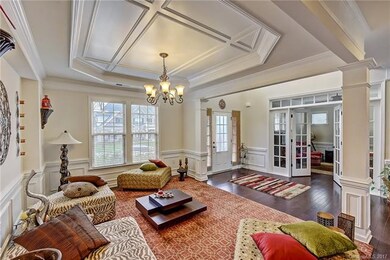 Lovely Dining Room featuring decorative tray ceili