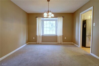 DINING ROOM: The formal dining room connects the l