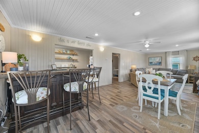 The open concept living features ship lap ceilings