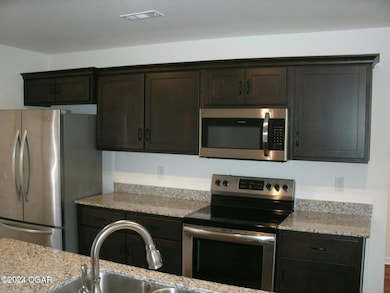 608 Cass Cir, Duenweg, MO 64841 - photo 6