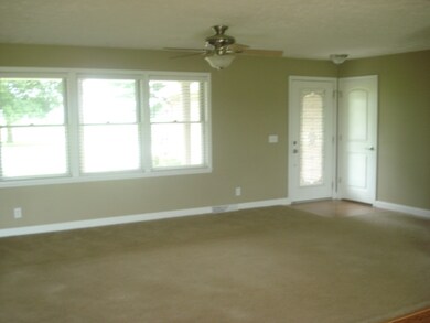 Living Room open to Dining area and Kitchen