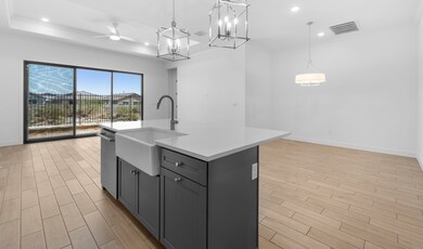 Kitchen with white apron-front sink