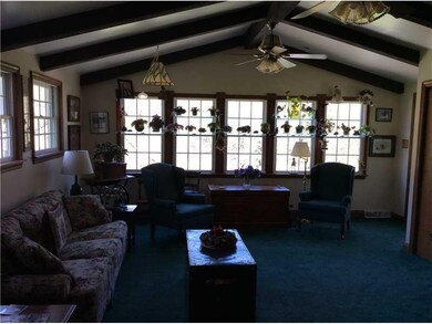 Family Room. A bank of windows brings natural ligh