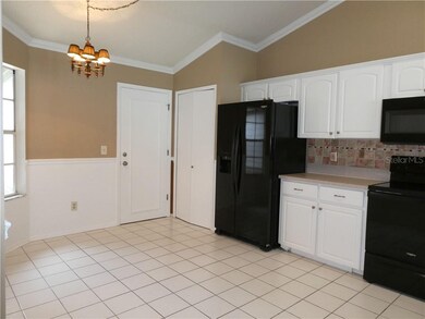 Large kitchen with breakfast nook and pantry featu