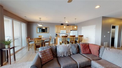 Efficient kitchen with extra bar seating makes for