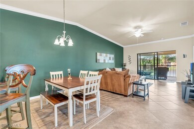 Dining space with light tile patterned flooring, c