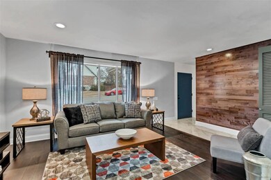 Living Room, showing hardwood accent wall.