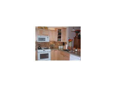 Upgraded appliances and Cabinets.  Tiled backsplas