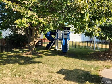 View of yard featuring a playground