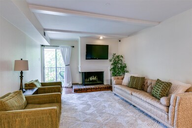 A fireplace is the focal point to this spacious ro
